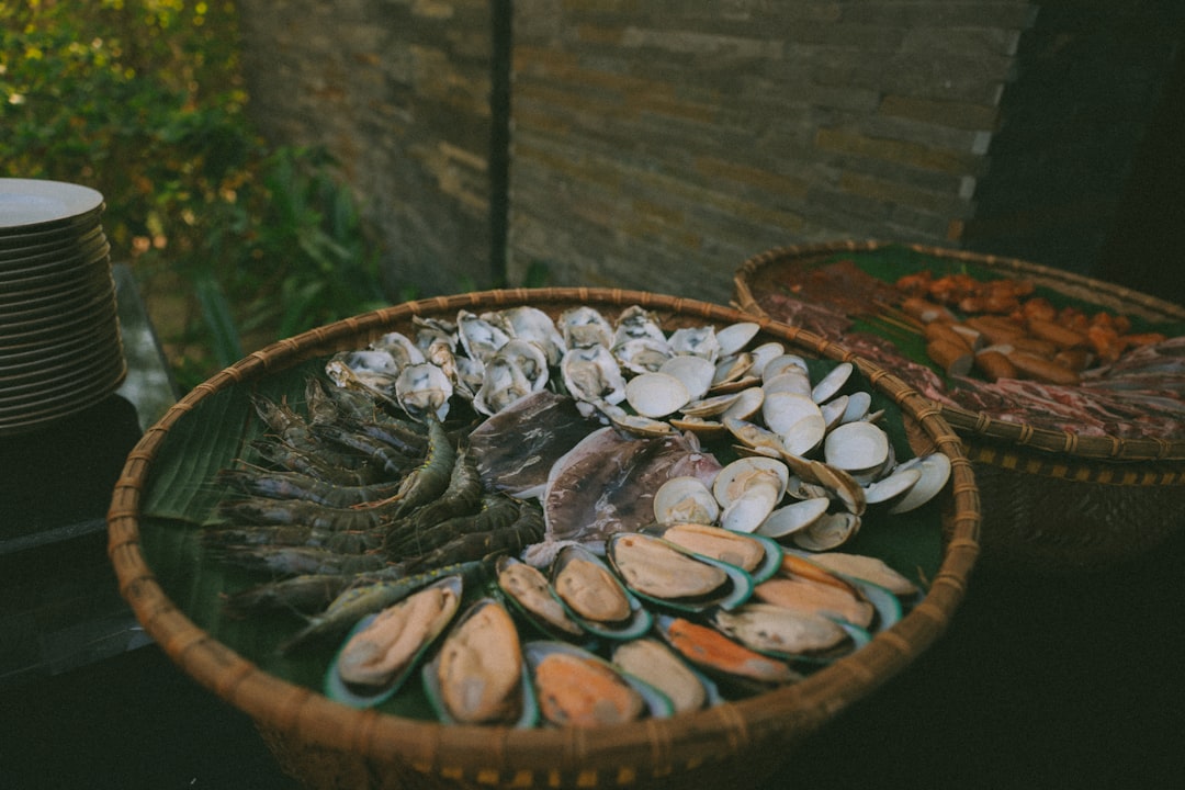 Assortment of fresh seafood in woven baskets